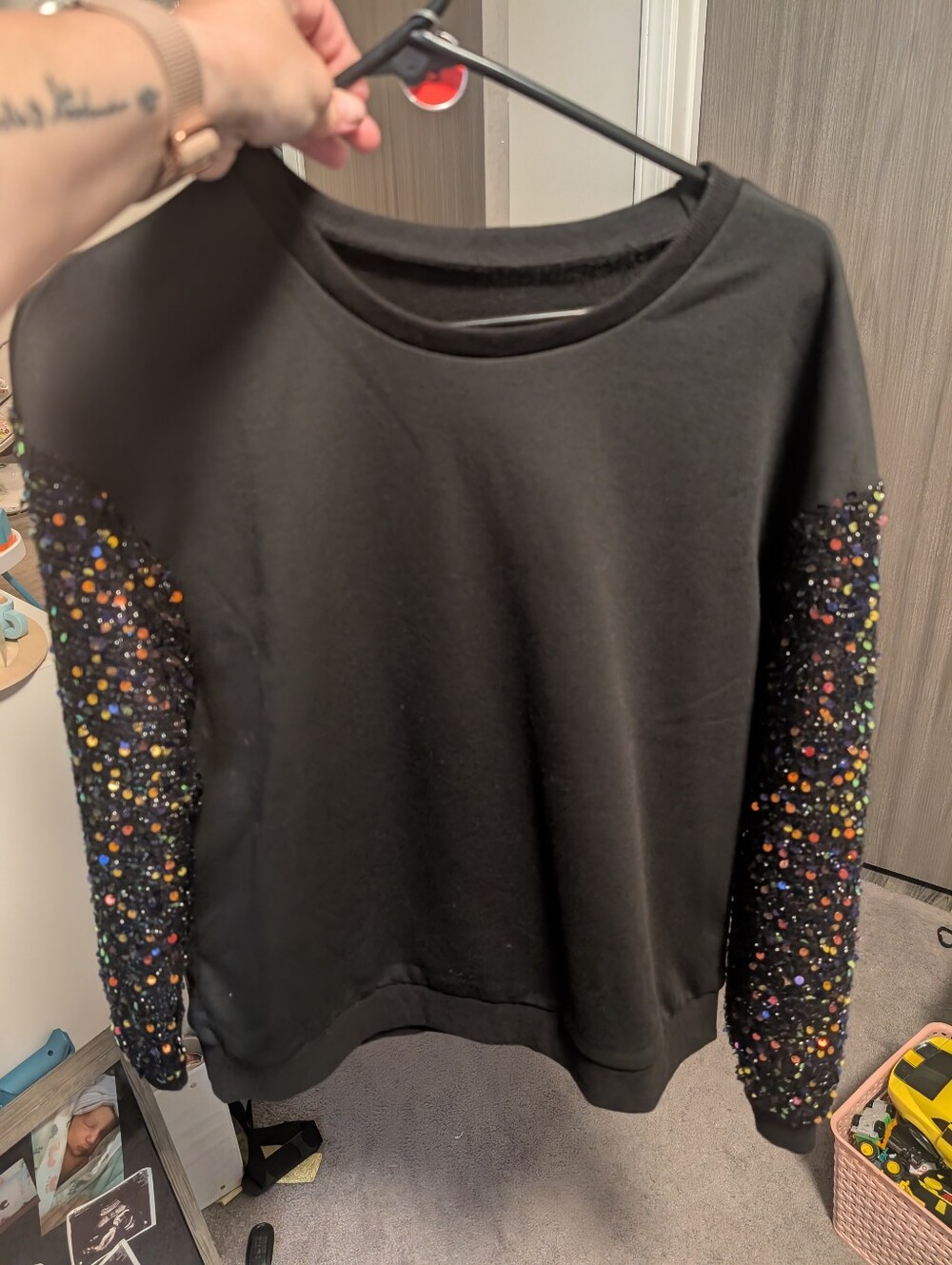 Amazon Black Sweatshirt with Multicolor Sequin Sleeves